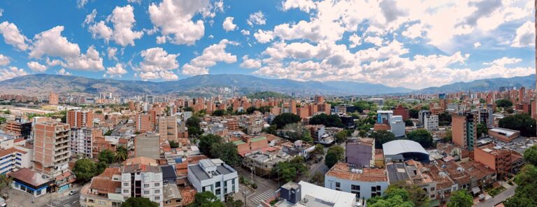 Medellín skyline on a clear day with the Andes mountains behind the city