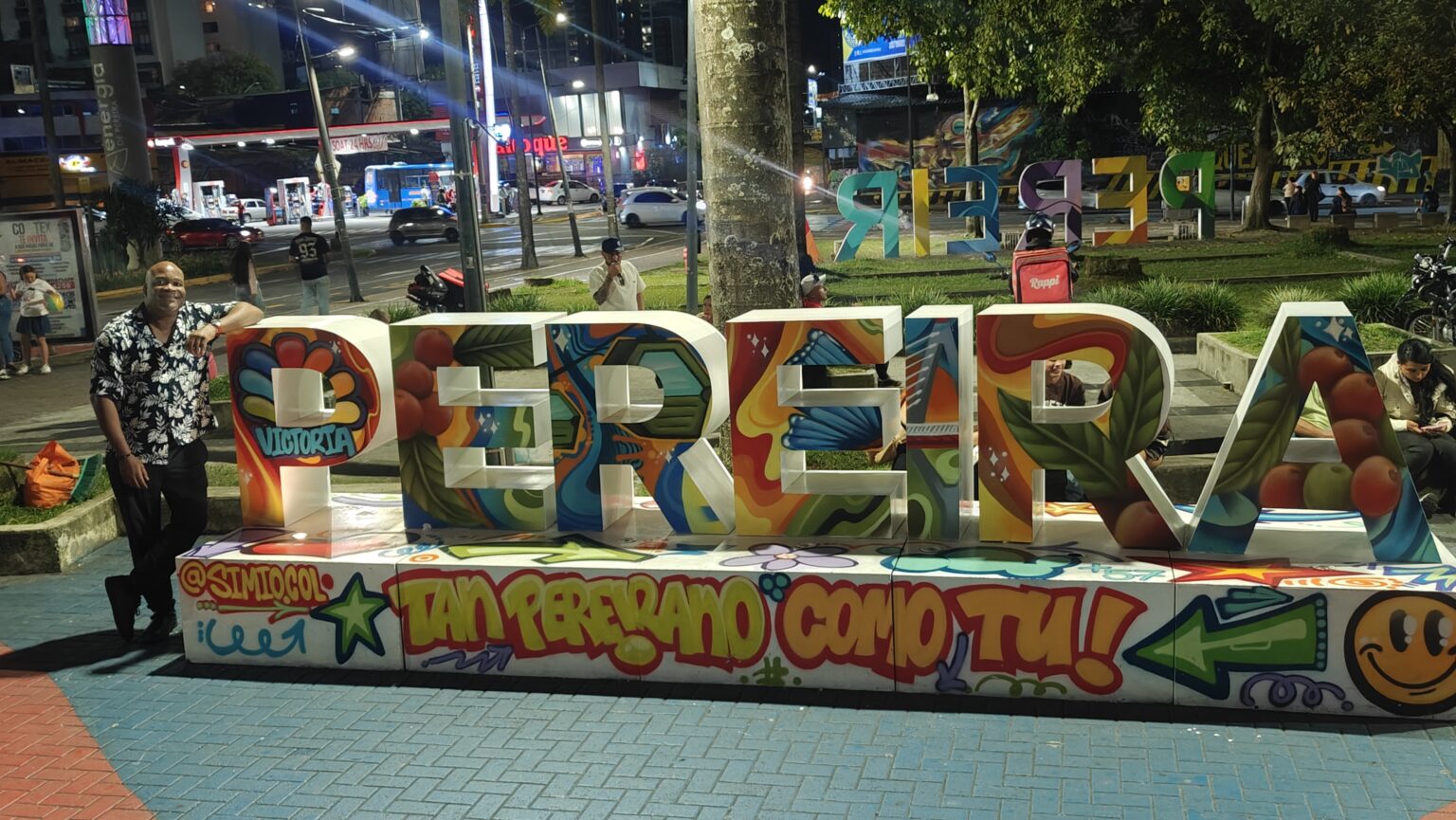 Shep in Colombia after moving from the USA, at the Pereira city sign in the coffee region