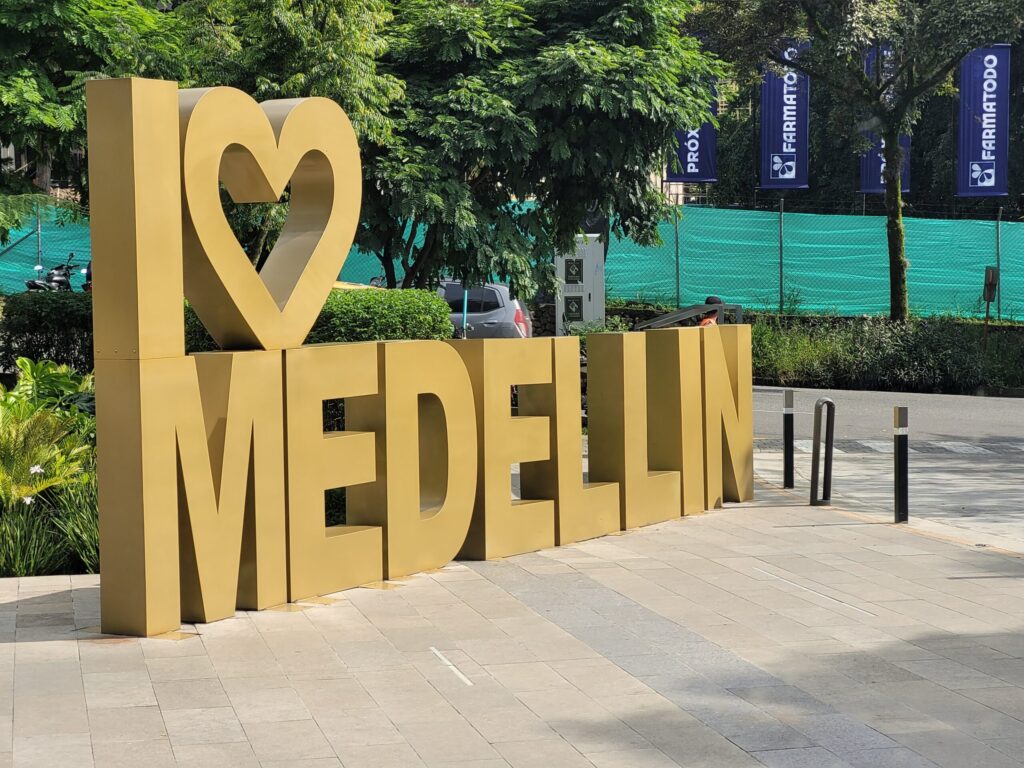 The gold Medellín sign — Medellín is the city named in the US Embassy dating-app security alert