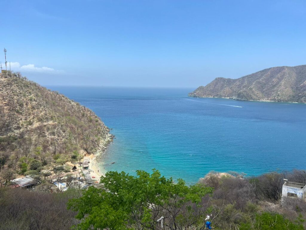 Crystal-blue Caribbean waters at Santa Marta, Colombia — the life a well-planned move to Colombia buys