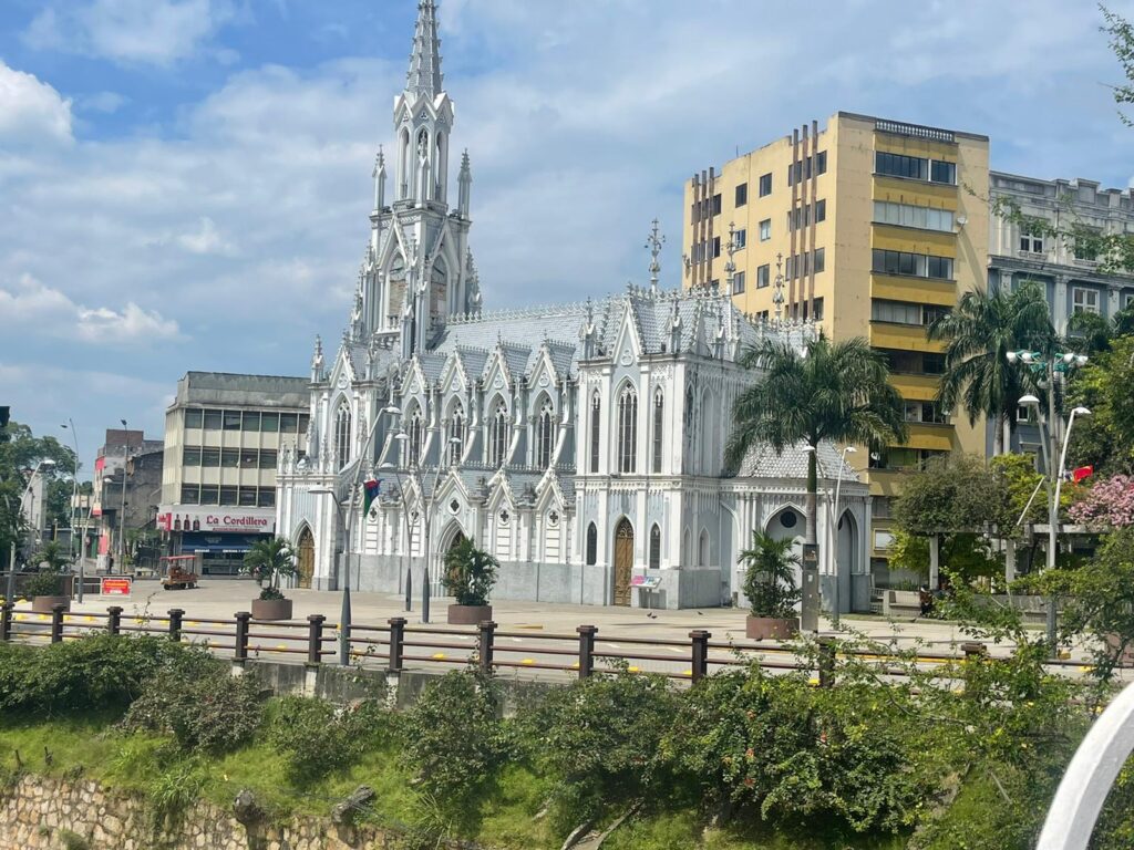 La Ermita church in Cali, Colombia, with the city and palms around it, photographed by the author