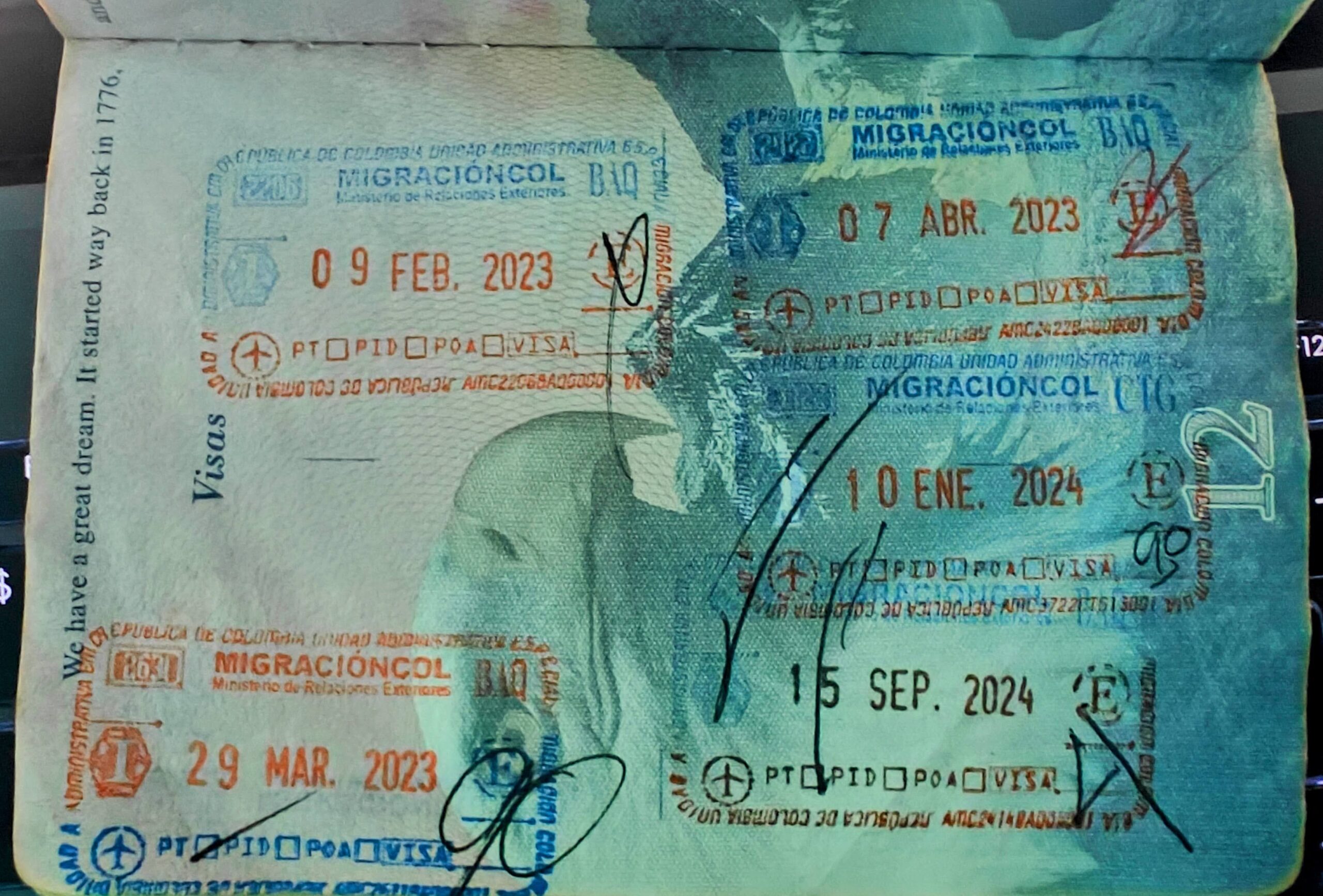 A passport with five Colombian entry stamps from Migración Colombia