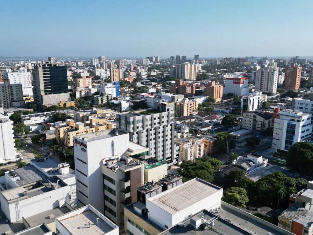 Aerial view of a mid-rise Colombian city, an ordinary neighborhood where most buying property in Colombia happens